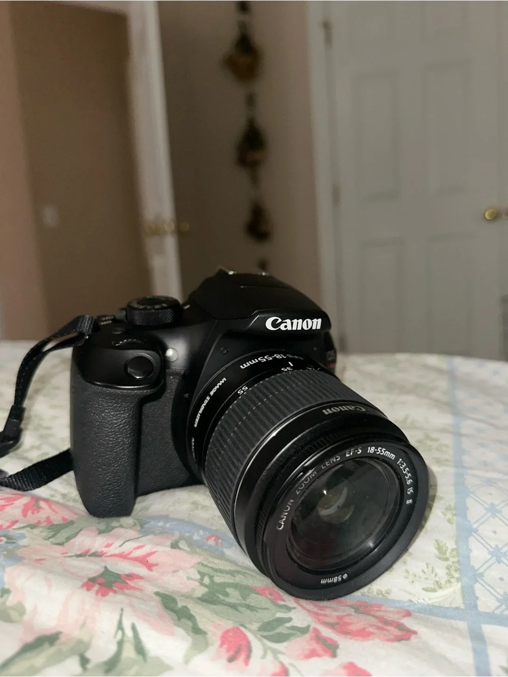 Canon Black DSLR with 18-55mm Zoom Lens